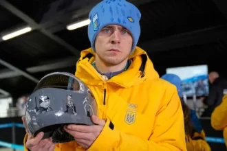 IOC Bars Ukrainian Athlete Over Helmet Honoring War Victims