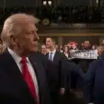 Trump Meets ‘Black People Aren’t Apes’ Sign at State of the Union Arrival