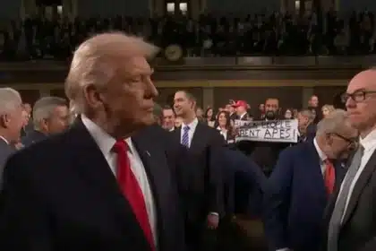 Trump Meets ‘Black People Aren’t Apes’ Sign at State of the Union Arrival