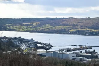 Iranian Man, Romanian Woman Charged in UK Nuclear Sub Base Breach Bid