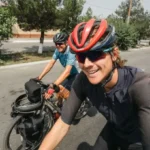 Father-Son Duo Cycles Globe in 400 Days, China Shines Brightest