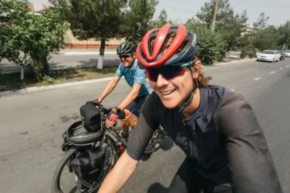 Father-Son Duo Cycles Globe in 400 Days, China Shines Brightest