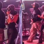Kim Kardashian Links Arms with Lewis Hamilton at Bieber Coachella Set