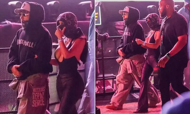 Kim Kardashian Links Arms with Lewis Hamilton at Bieber Coachella Set Kim Kardashian Links Arms with Lewis Hamilton at Bieber Coachella Set