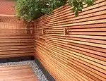 What Your Garden Fence Reveals: Grey Paint Bad Taste to Posh Natural Edges