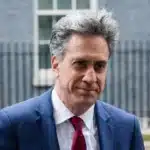 Ed Miliband Urged to Maintain Course on Car Ban Amidst Review Calls