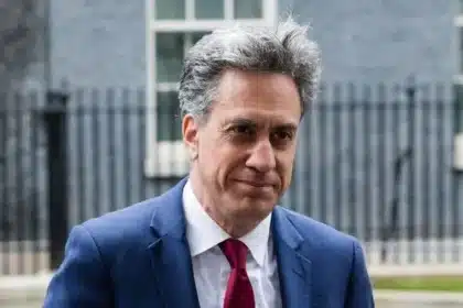 Ed Miliband Urged to Maintain Course on Car Ban Amidst Review Calls