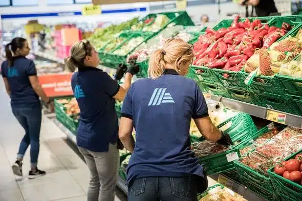 UK Supermarkets Hike Wages: £13 Living Wage Rule Impacts Thousands