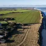 Coastal Erosion Threatens Historic Sailor Graves on Norfolk Coast