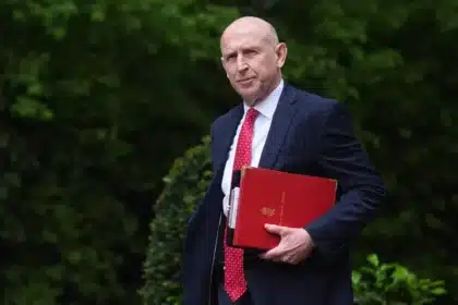 Defence Secretary Resigns Over Funding Shortfall