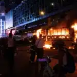 Knicks Championship Ignites NYC; Bus Fire, Shooting Mar Celebrations