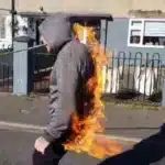 Daredevil Pulls Burning Police Car With Teeth for Charity