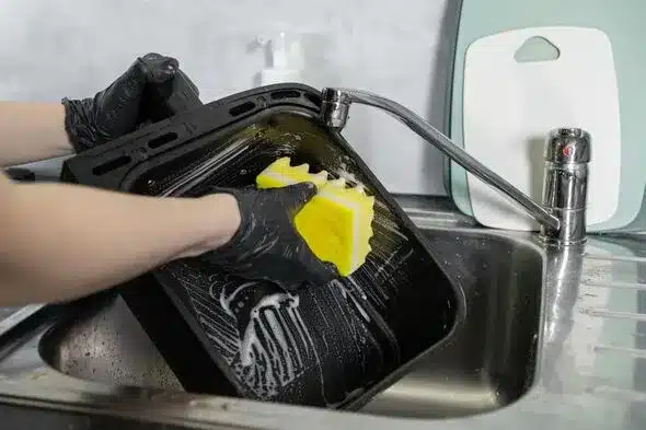 Effortless Air Fryer Cleaning: Baking Soda & Dish Soap Method