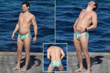 Rob Mills Makes a Splash in Duck-Themed Swimwear at Sydney Beach