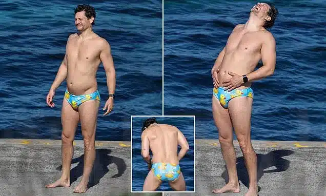 Rob Mills Makes a Splash in Duck-Themed Swimwear at Sydney Beach Rob Mills Makes a Splash in Duck-Themed Swimwear at Sydney Beach